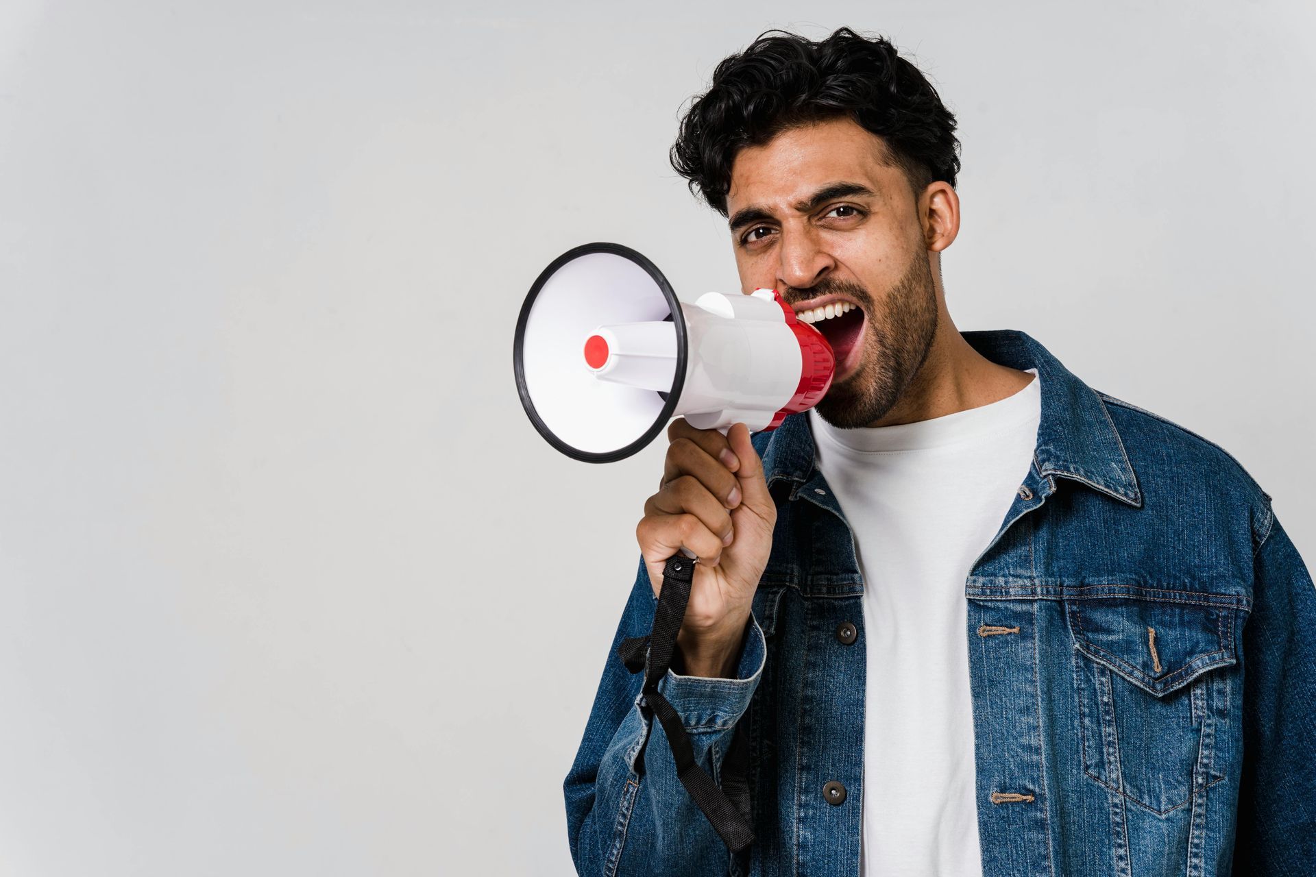A man shouting into a megaphone